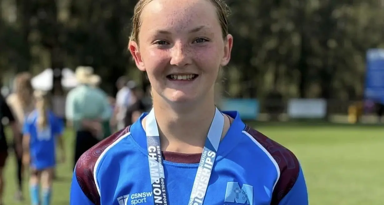 Chloe part of state winning girls Rugby 7s side