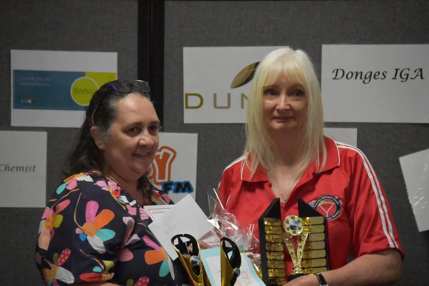 Jane Sibley presenting Gail Douglas with the prizes for her Champion Print.
