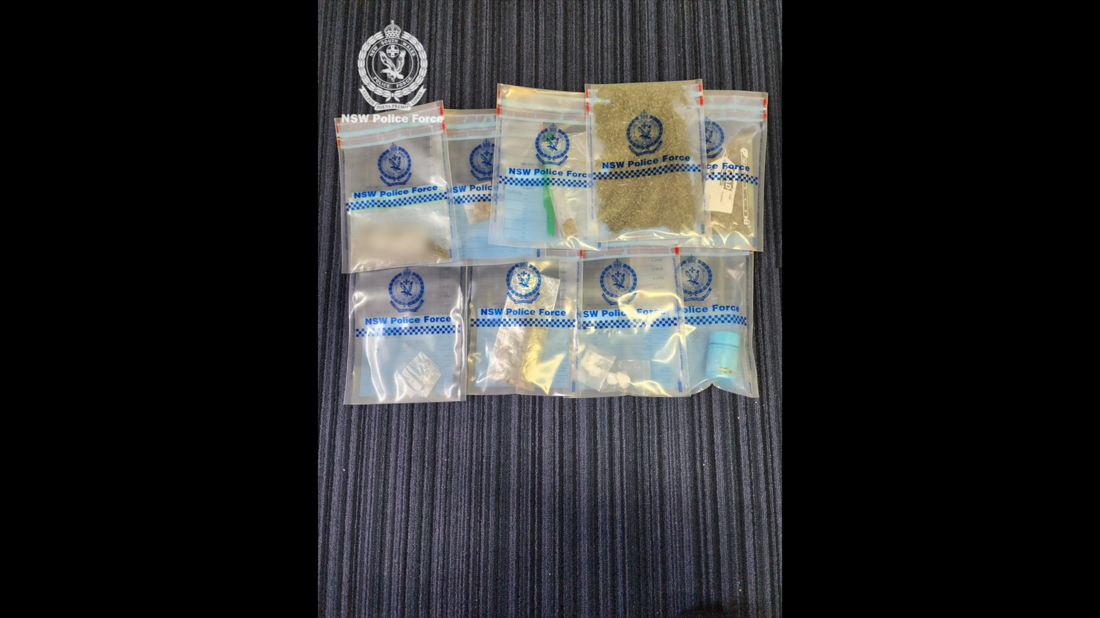 Man charged after drugs and weapons seized