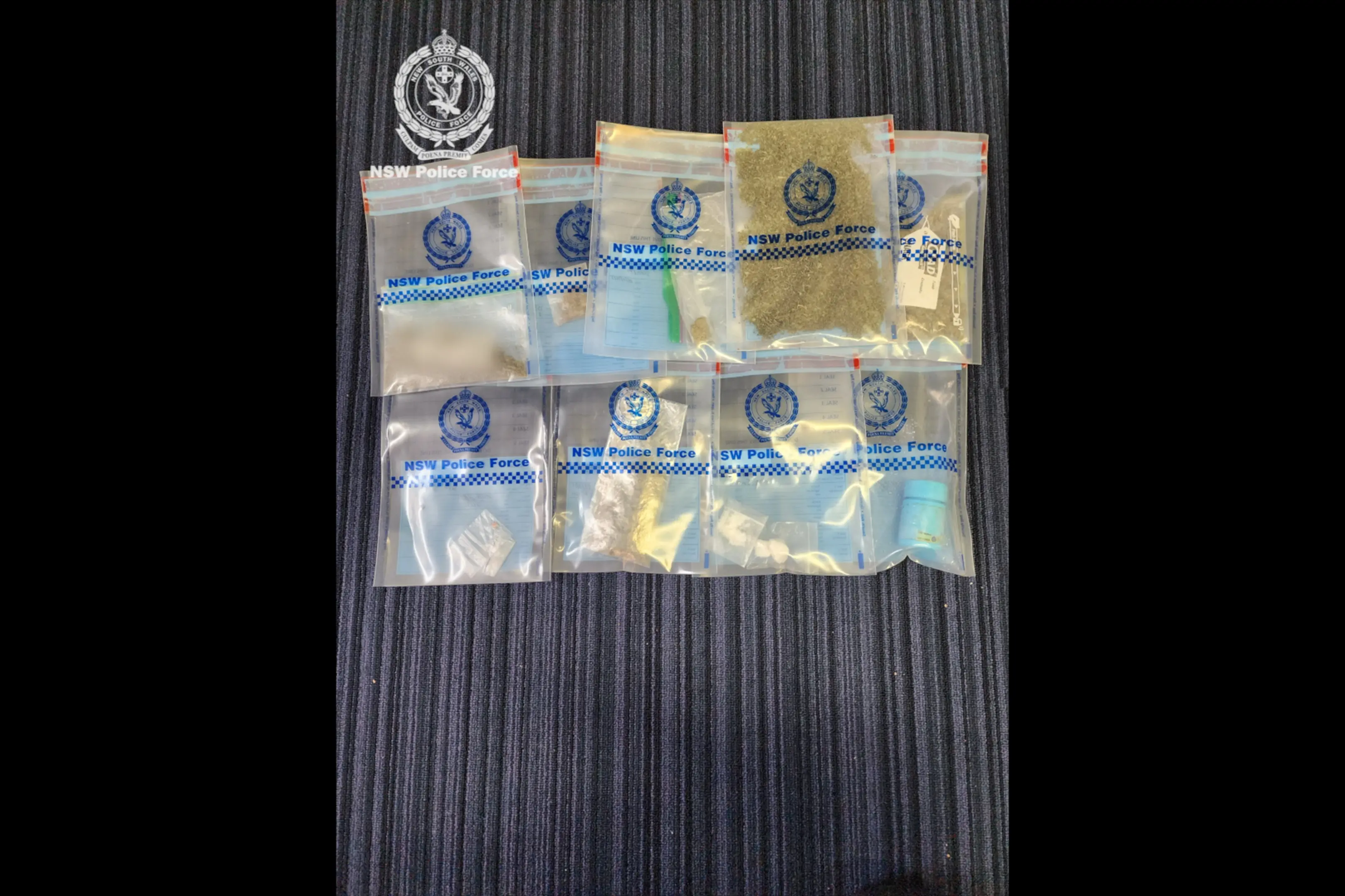 Man charged after drugs and weapons seized