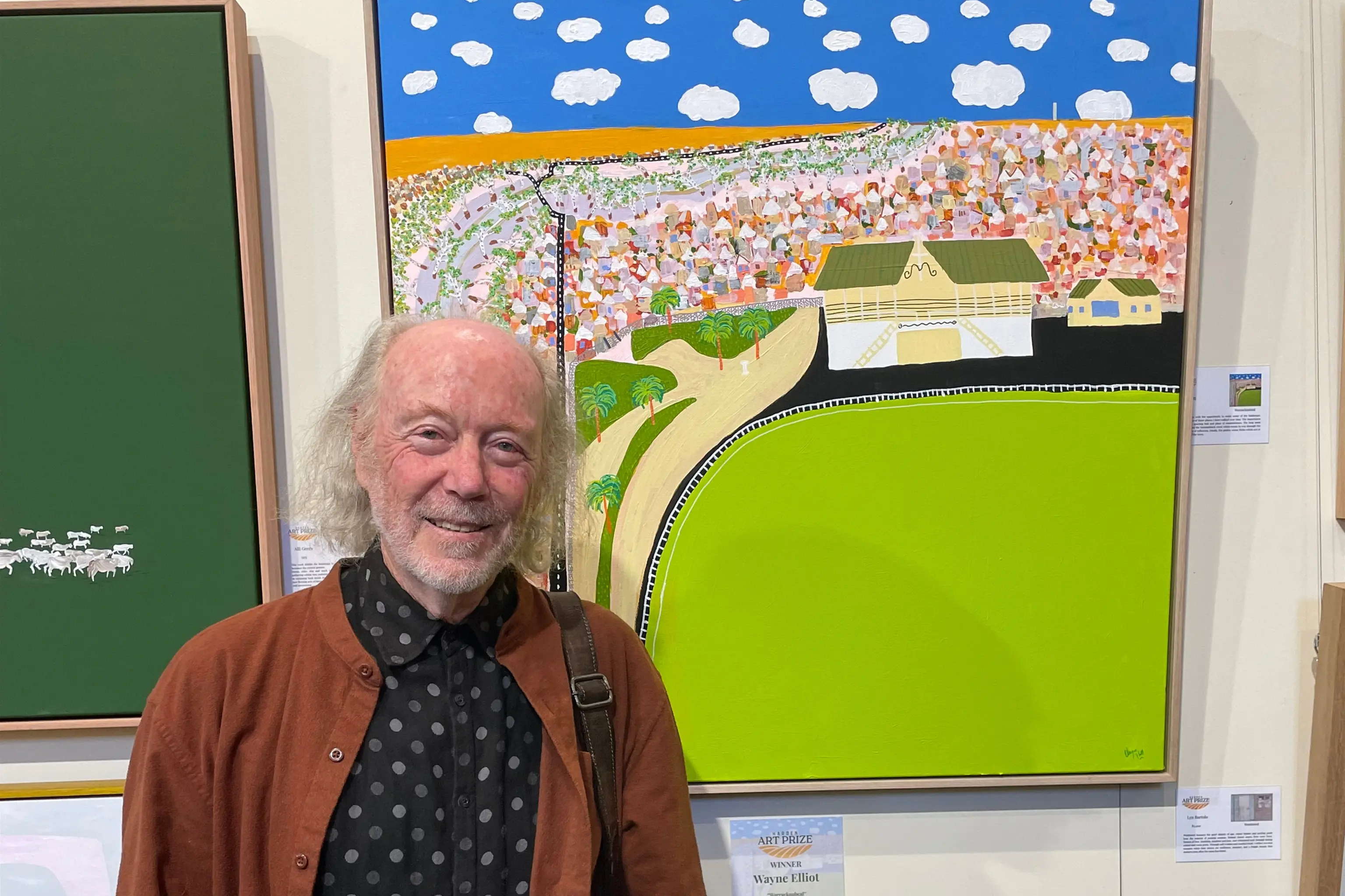 <p>Winning artwork pictured with one of the judges, acclaimed landscape artist Chris Kenyon</p>\\n