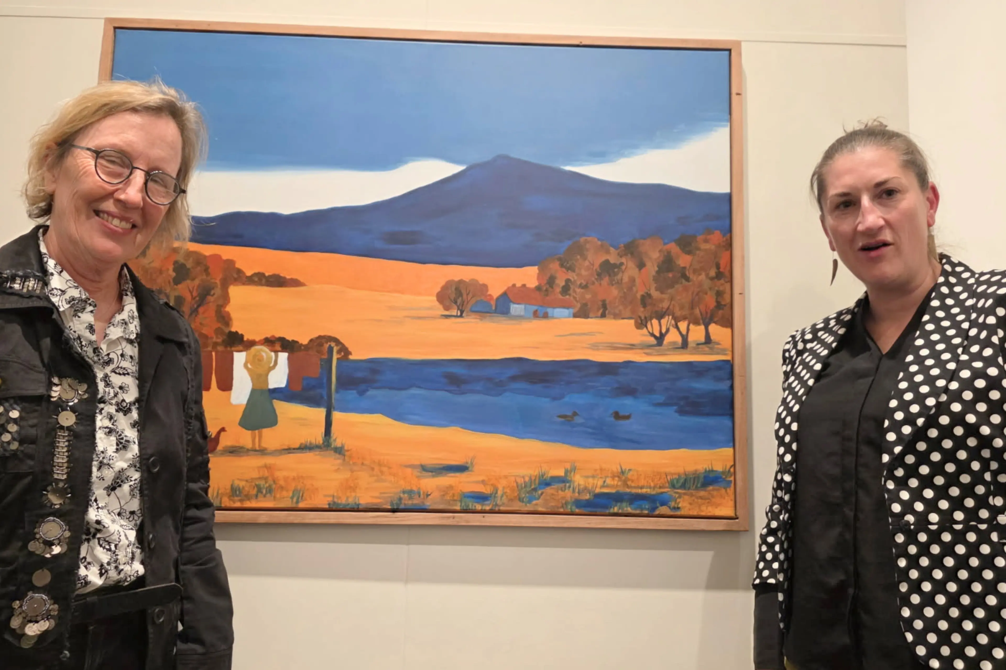 <p>Boorowa artist Ang Hart with fellow finalist Denise Scholz Wulfing beside Hart\\u2019s work Silence of the Land at the 2026 Central Belonging Art Award exhibition at Cowra Regional Art Gallery.</p>\\n