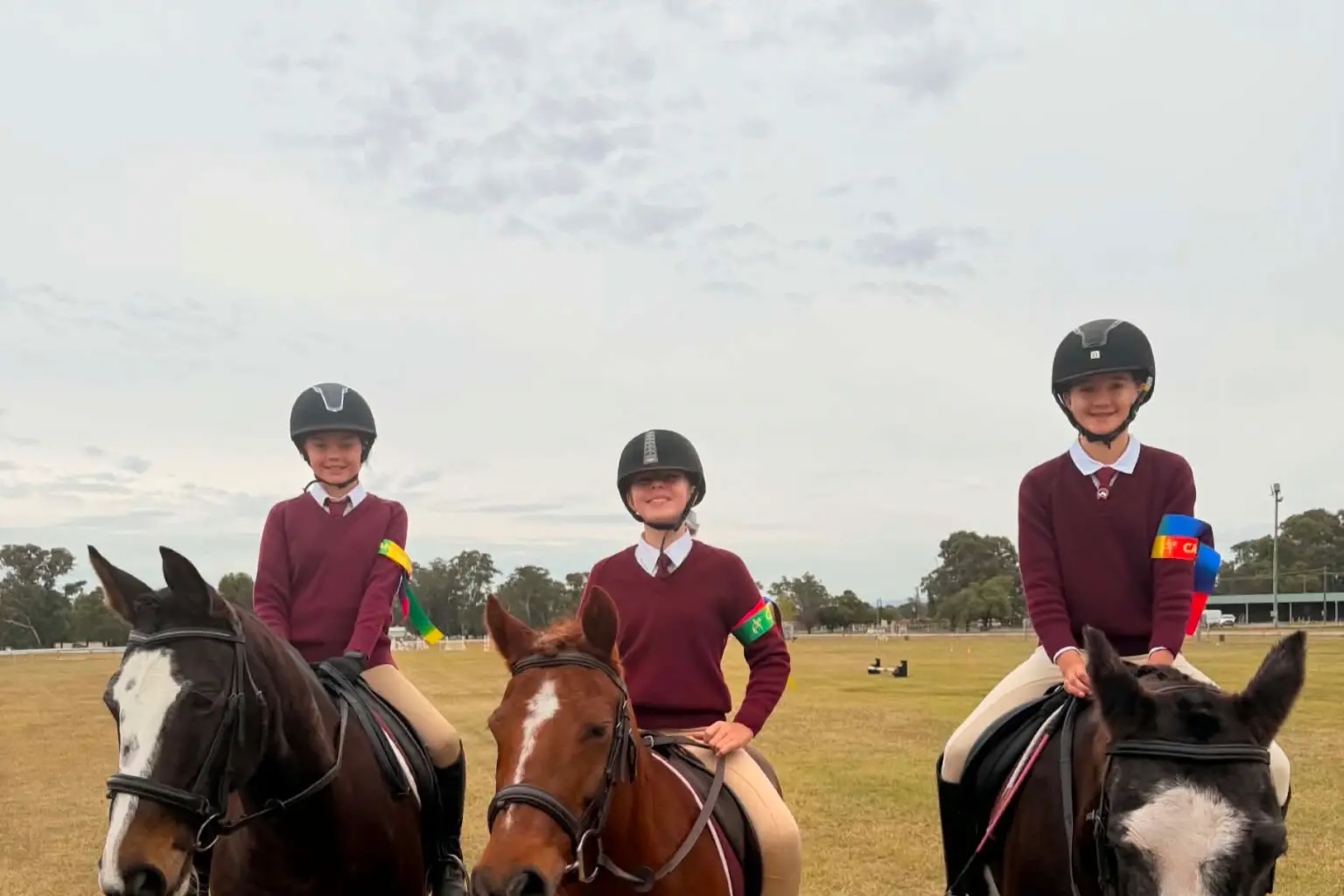 <p>WINNING SMILES: Lexi Shoemark on her horse Dakota (left), Miley Richens on her horse Rumba (middle) and Charlotte Callinan on her horse Flo (right) showing off their rainbow event. PHOTOS: Supplied</p>\\n