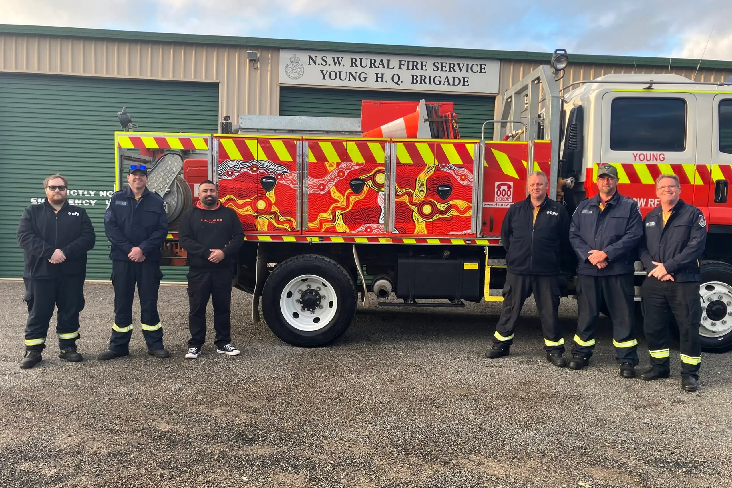 <p>Stewart James (inside left) and Young Brigade Captain John Tarrant (inside right) plus District Manager Andrew Dillon and members of the Young RFS brigade executive were excited for the unveiling of the artwork.</p>\\n