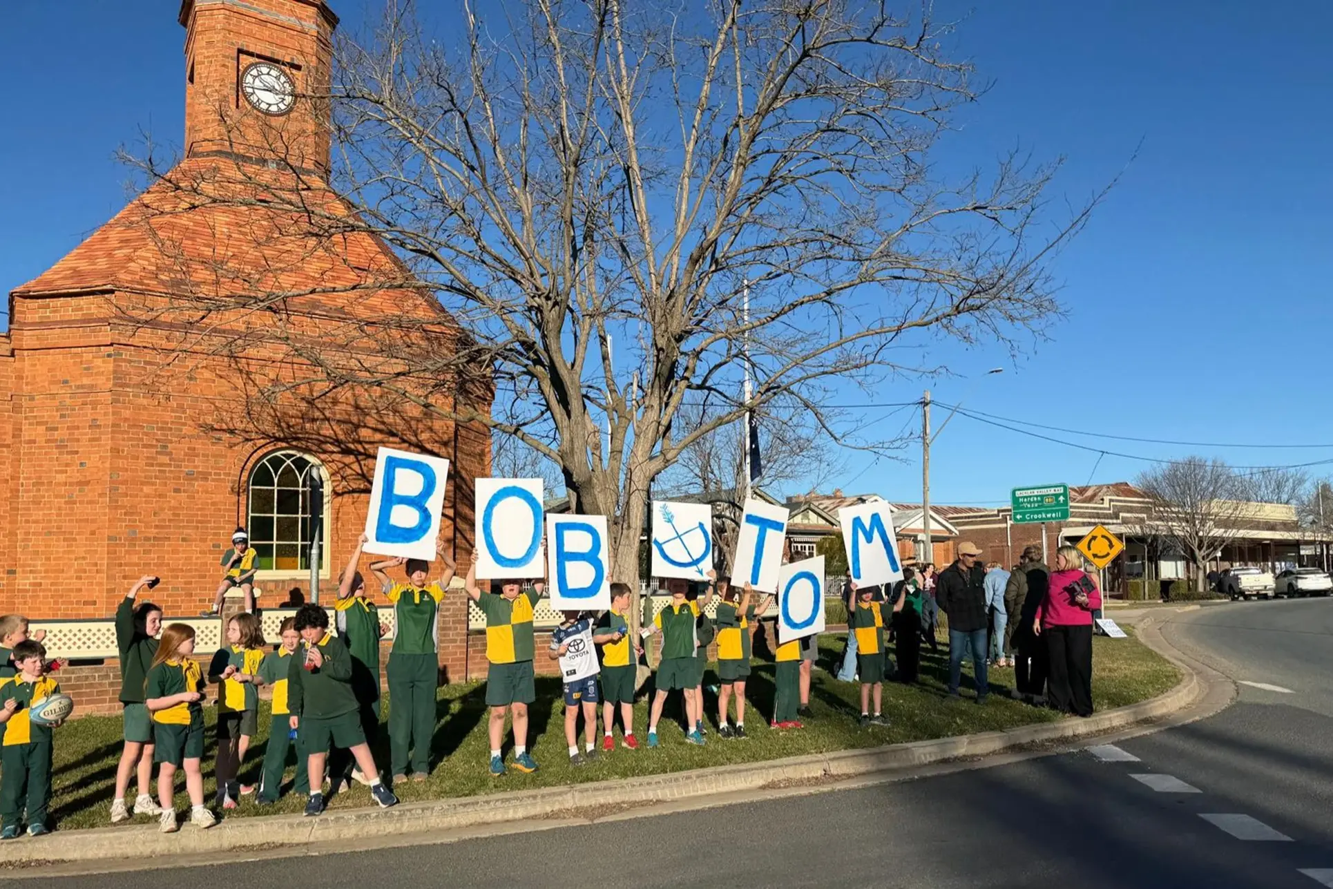 <p>Students and community members welcomed Bob Montgomery and Tom Malcolm as they stopped in Boorowa as part of their ride from journey from Broome to Bowral, raising funds and awareness for Motor Neurone Disease NSW. PHOTO: Supplied</p>\\n