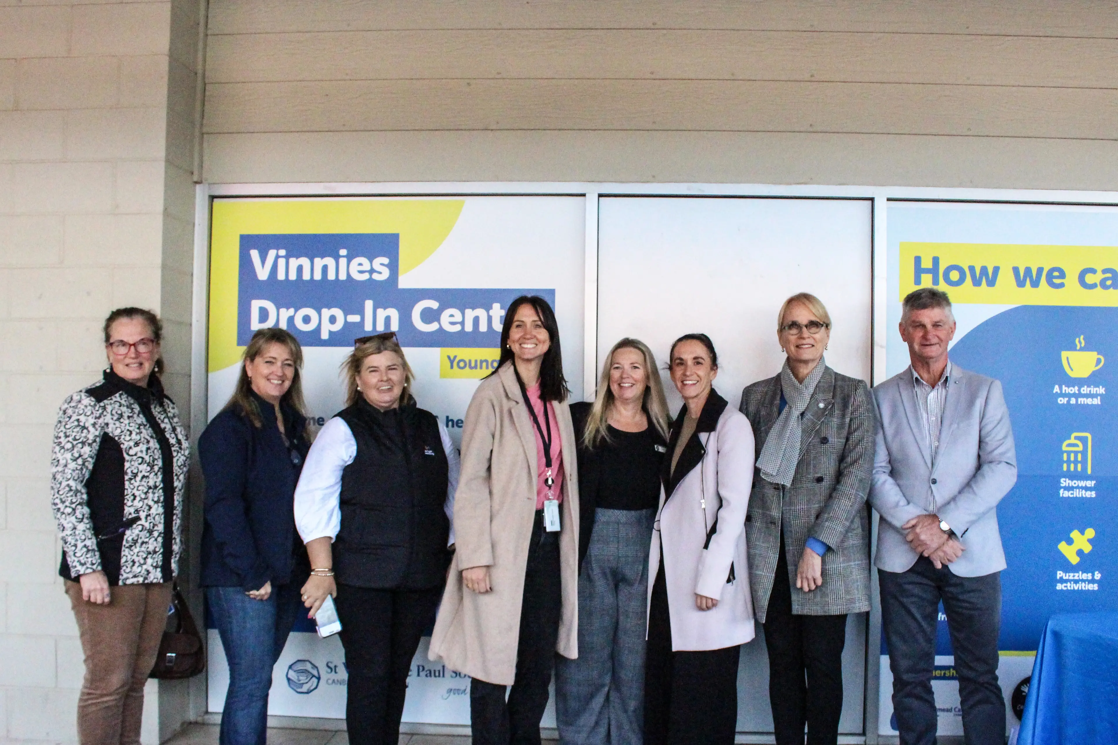 <p>Community collaboration brought Young\\u2019s new Vinnies drop-in centre to life. From left: Marita Wilder-Mbeya, Wellways; Sharon McCoy, Vinnies; Patricia Reynolds, Argyle Housing; Emma Whitechurch, Medicare Mental Health; Naomi Peters, Hilltops Community Hub; Kerri Palmer, Young Crisis Accommodation Centre; Lucy Hohnen, St Vincent de Paul Society Canberra/Goulburn CEO; and Hilltops Mayor Brian Ingram.</p>\\n