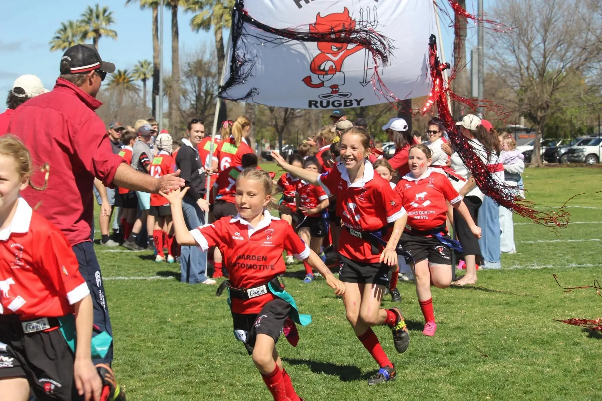 <p>The Devils Under 10s Tag team steam onto the field for their grand final. PHOTO: Supplied</p>\\n