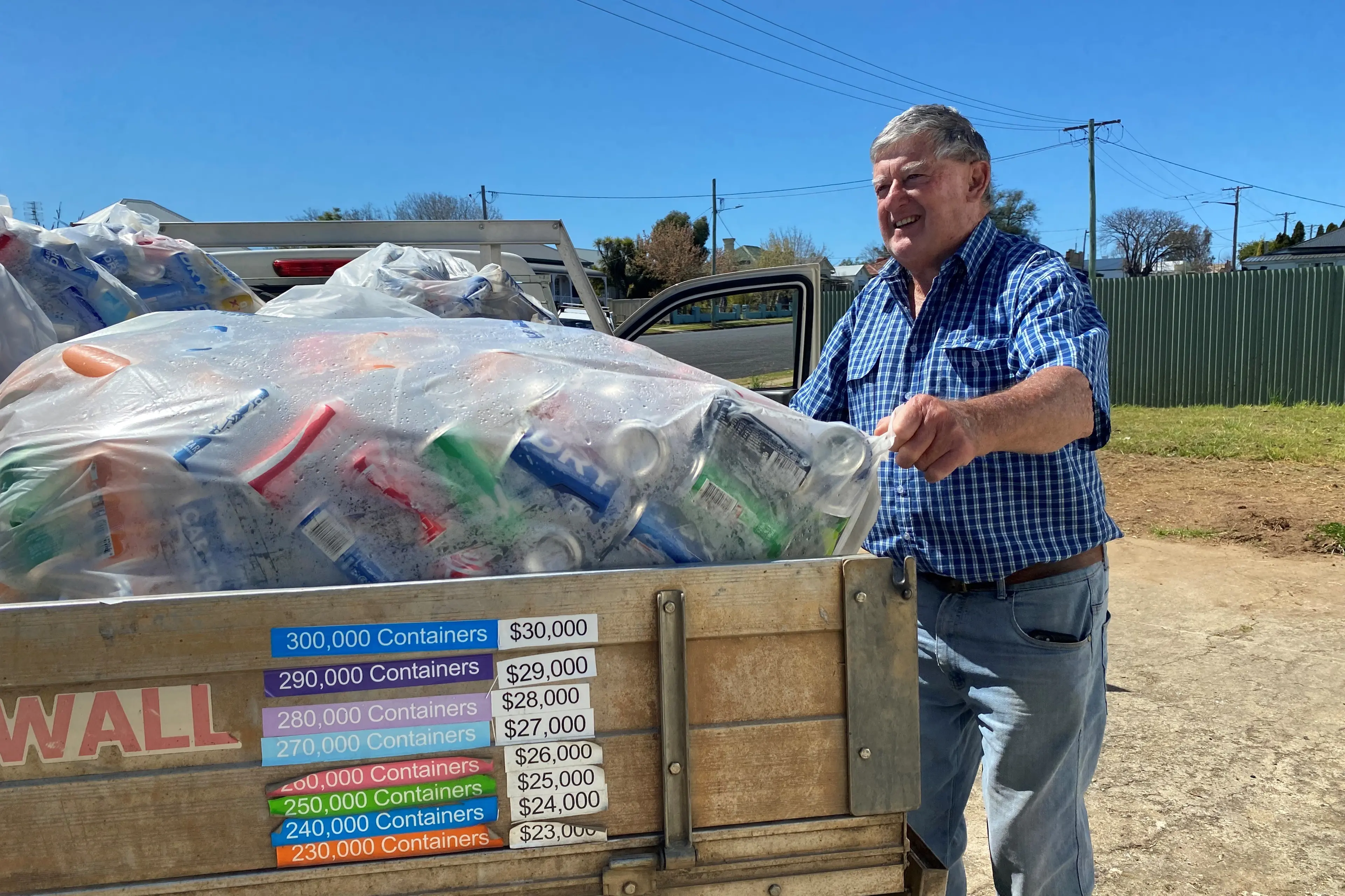 <p>Steve Pinney and his crew have passed $30,000 by recycling cans and bottles. PHOTO: Russ Haylock</p>\\n