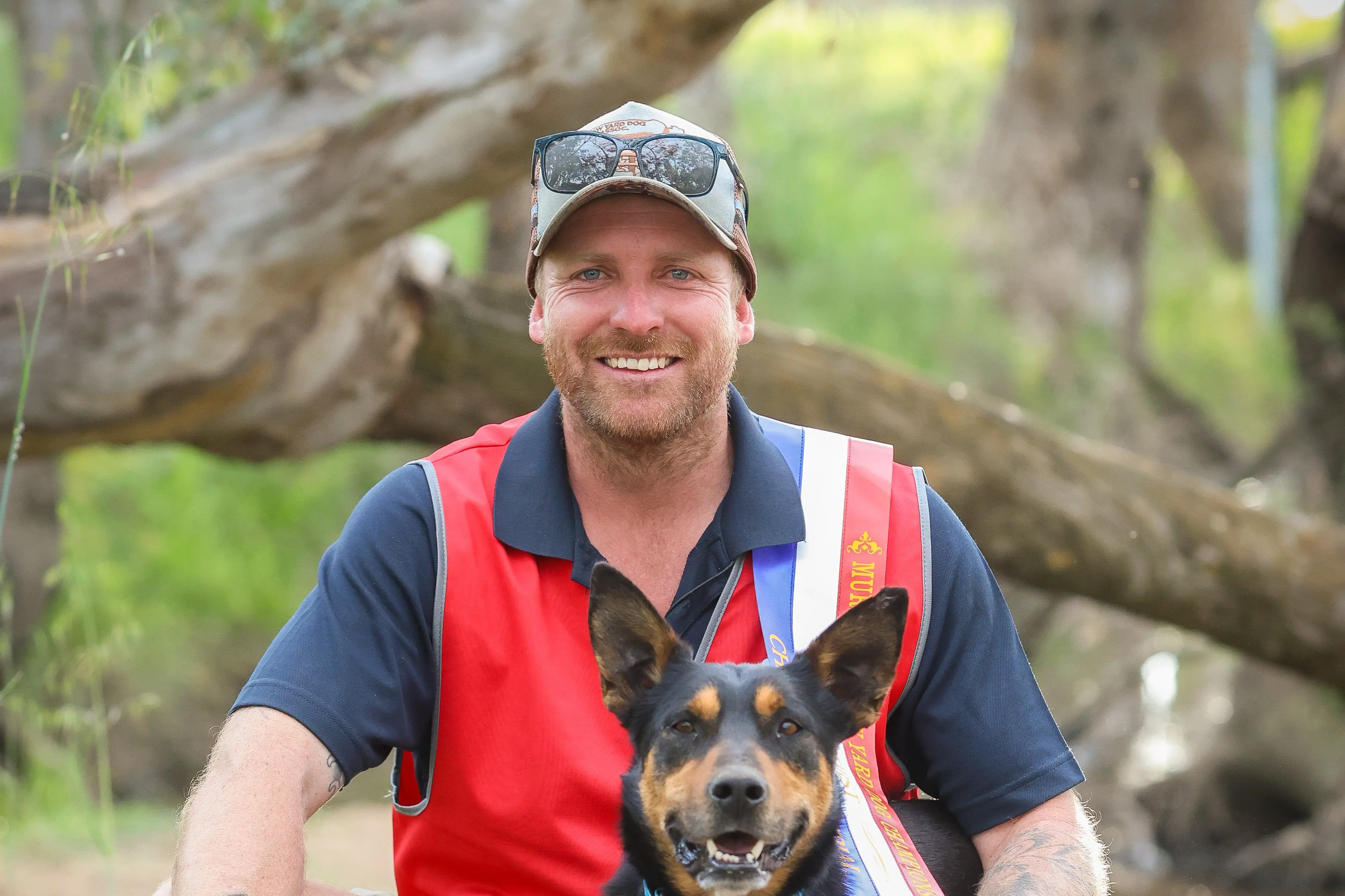<p>Thomas Woolford and his kelpie Mac pose with the spoils from their Henty win. PHOTO: Supplied</p>\\n