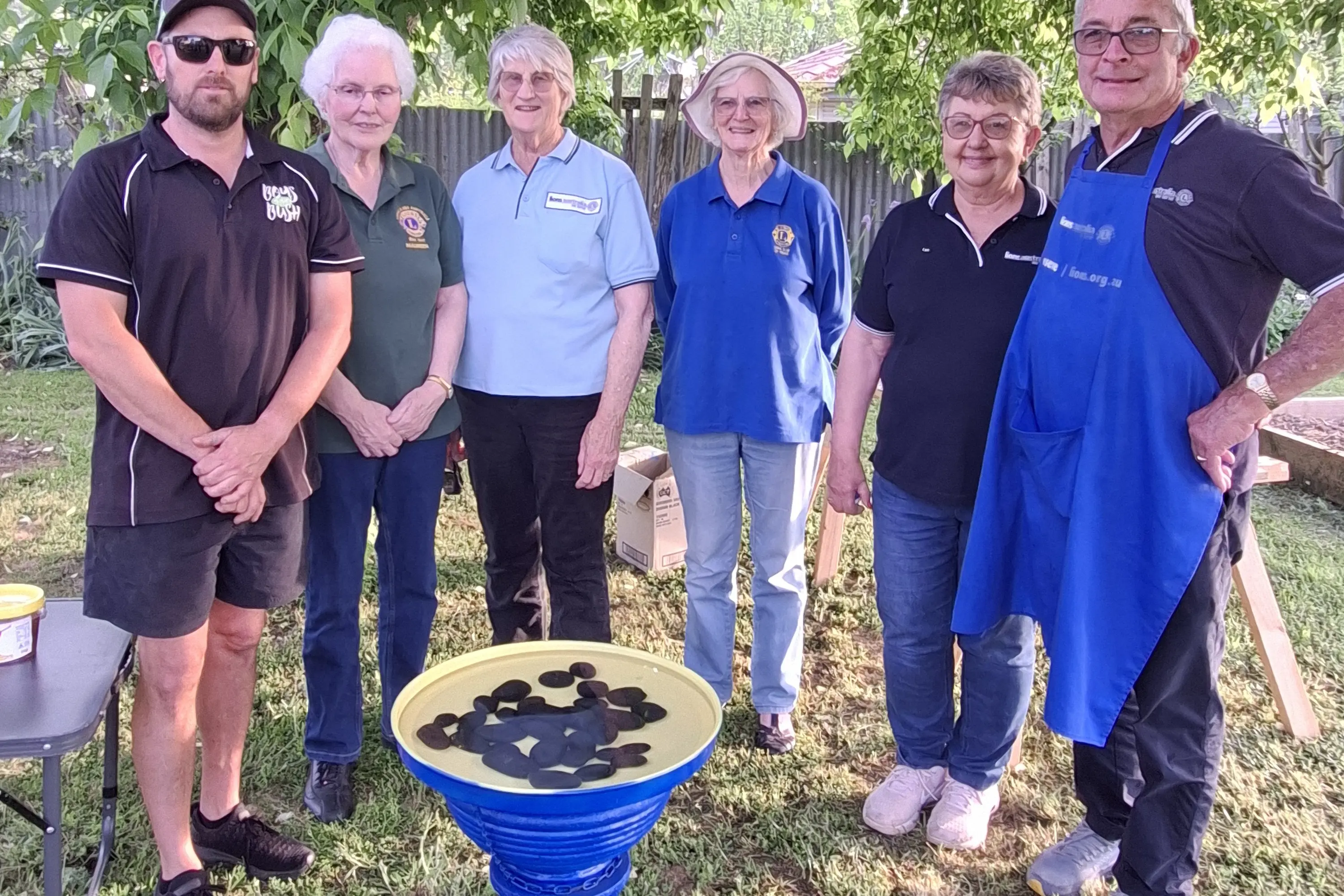 <p>Heather Miller donated a painted bird bath to the community garden. </p>\\n